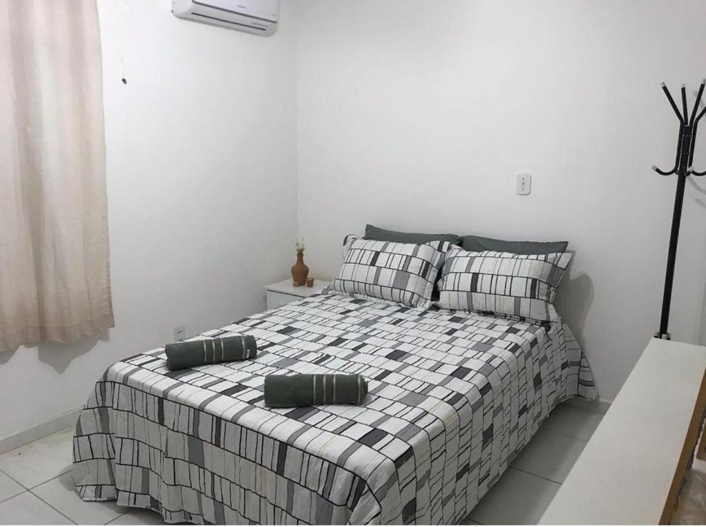 Cama o camas de una habitación en Guest House Maceió