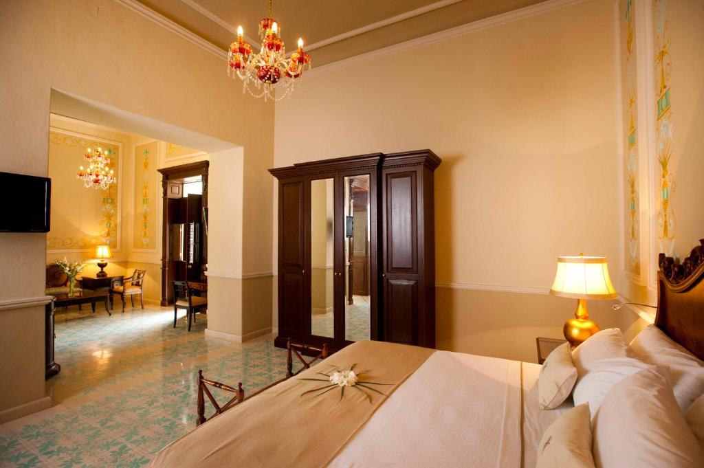 Postel nebo postele na pokoji v ubytování Mansión Mérida Boutique Hotel - Restaurant