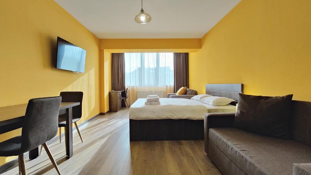 Postel nebo postele na pokoji v ubytování GVC 215 New Gudauri