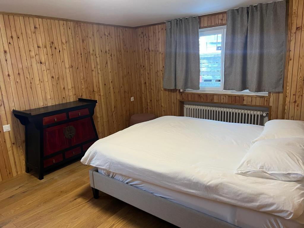 Postel nebo postele na pokoji v ubytování Romantica Grächen