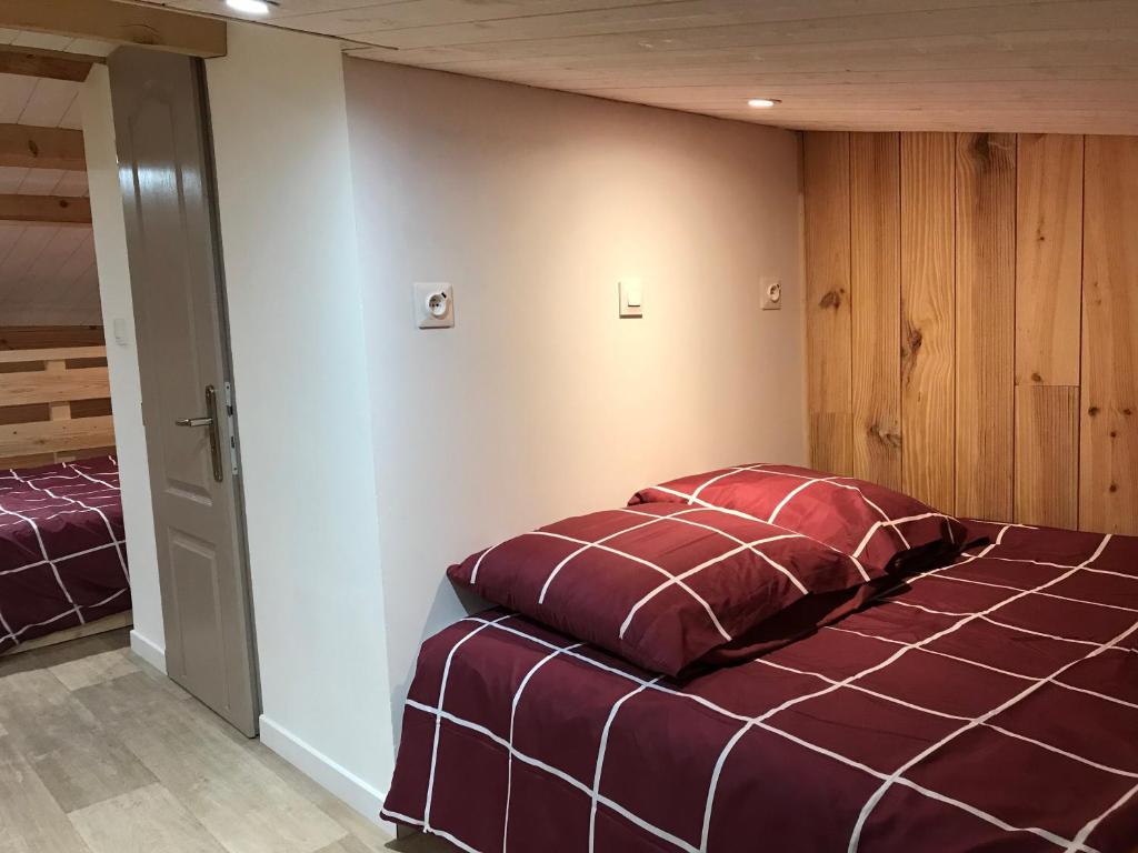 Postel nebo postele na pokoji v ubytování appartement ski au pied