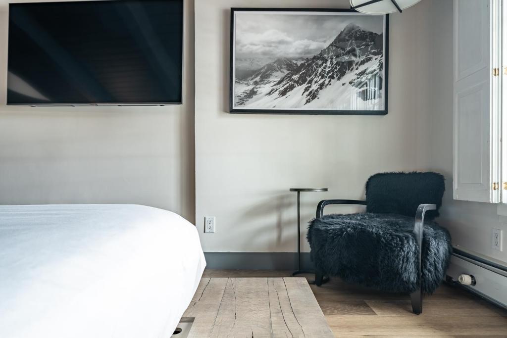 Postel nebo postele na pokoji v ubytování Lodge at Vail Condominiums