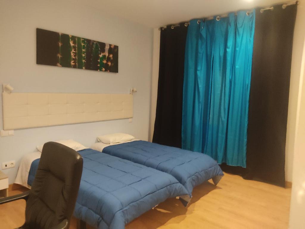 Postel nebo postele na pokoji v ubytování LPA PEREIRA Hotel restaurante
