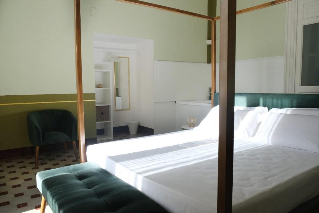 מיטה או מיטות בחדר ב-Toscano Palace Luxury Rooms Catania