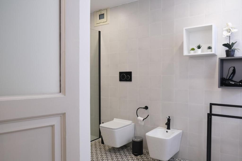 חדר רחצה ב-Toscano Palace Luxury Rooms Catania