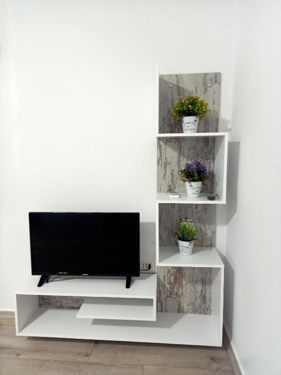 TV a/nebo společenská místnost v ubytování Room Click inn