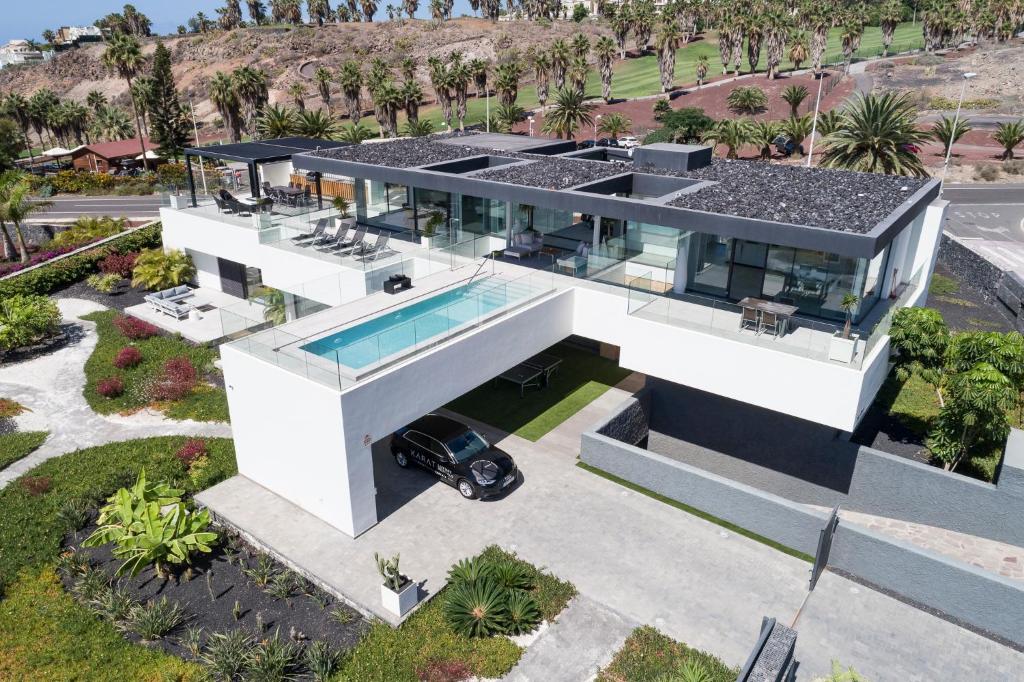 an aerial view of a house with a swimming pool at Karat Villa Macaronesia in Adeje