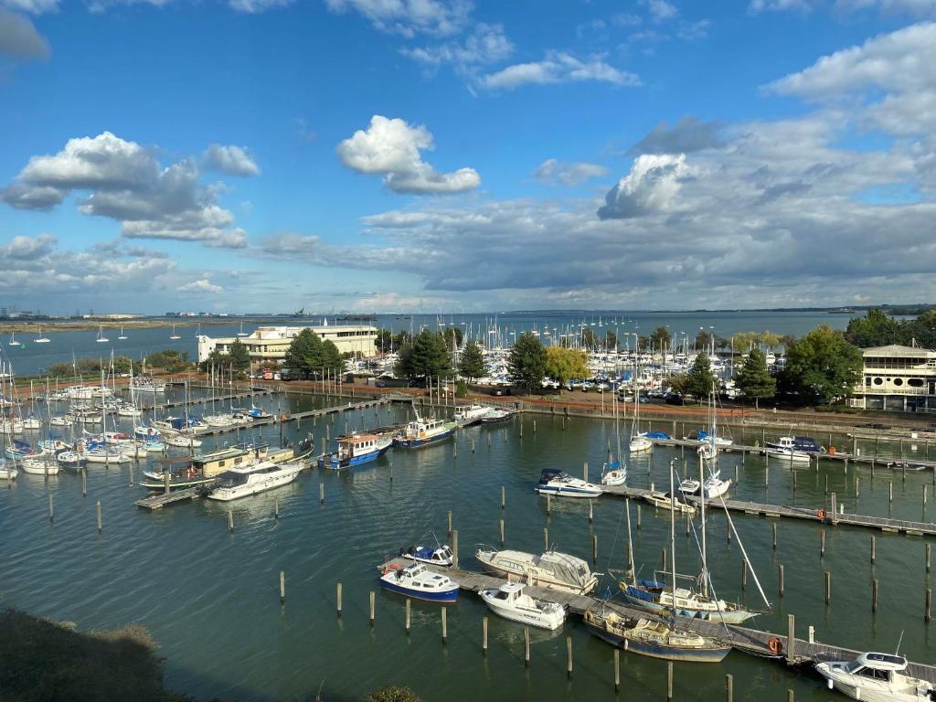 a group of boats docked in a harbor at Stunning Lake and City View 2BD/2BA in Kent