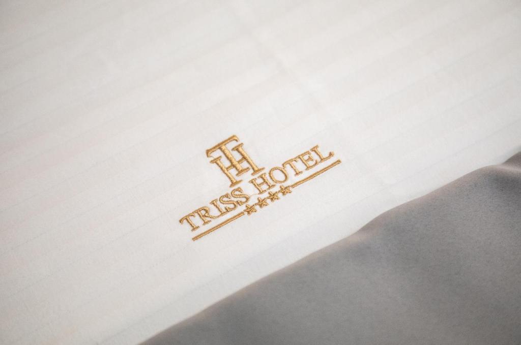 Certifikát, hodnocení, plakát nebo jiný dokument vystavený v ubytování Triss Hotel