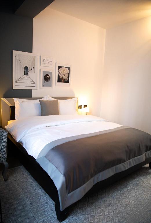 Postel nebo postele na pokoji v ubytování Triss Hotel