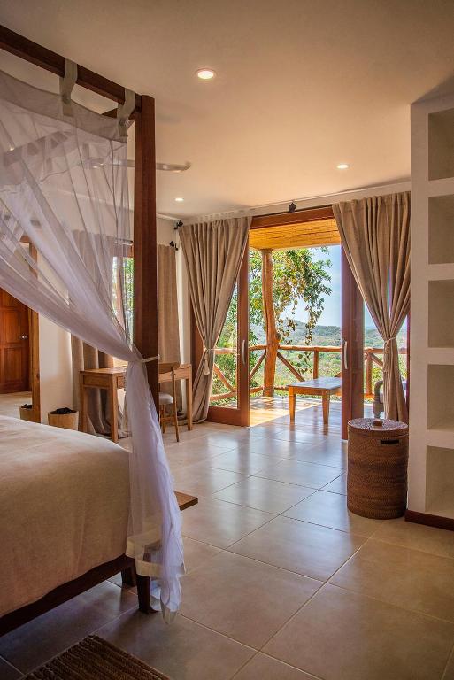 Postel nebo postele na pokoji v ubytování Tierra Magnifica Boutique Hotel