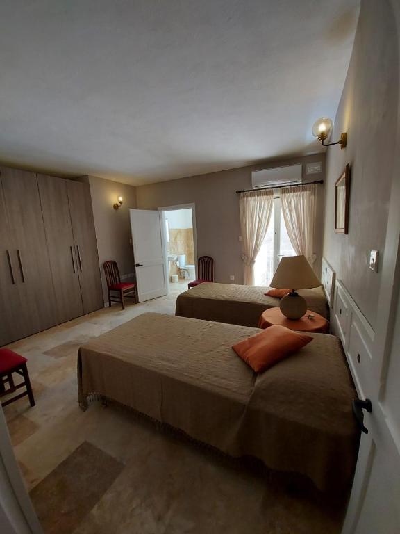 Postel nebo postele na pokoji v ubytování Casa Manduca Delicata