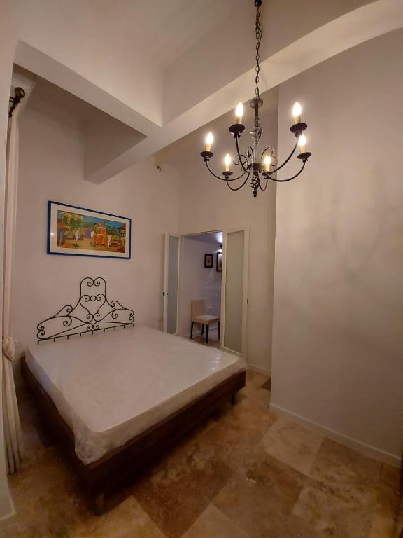 Postel nebo postele na pokoji v ubytování Casa Manduca Delicata