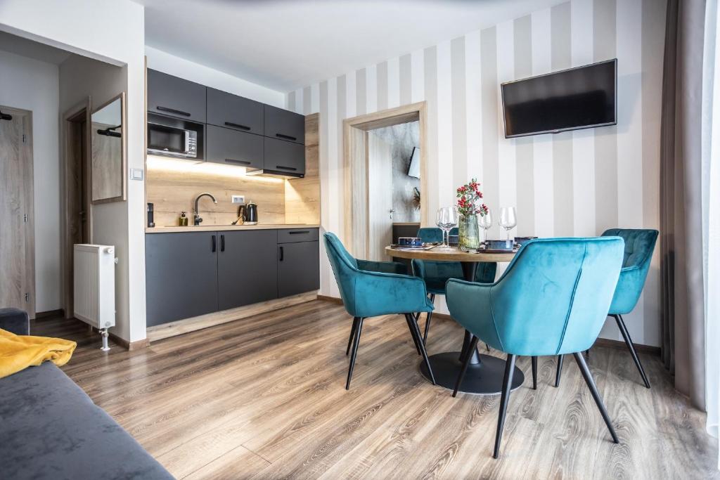 Kuchyňa alebo kuchynka v ubytovaní Hotel Demanova Apartments - Dependance