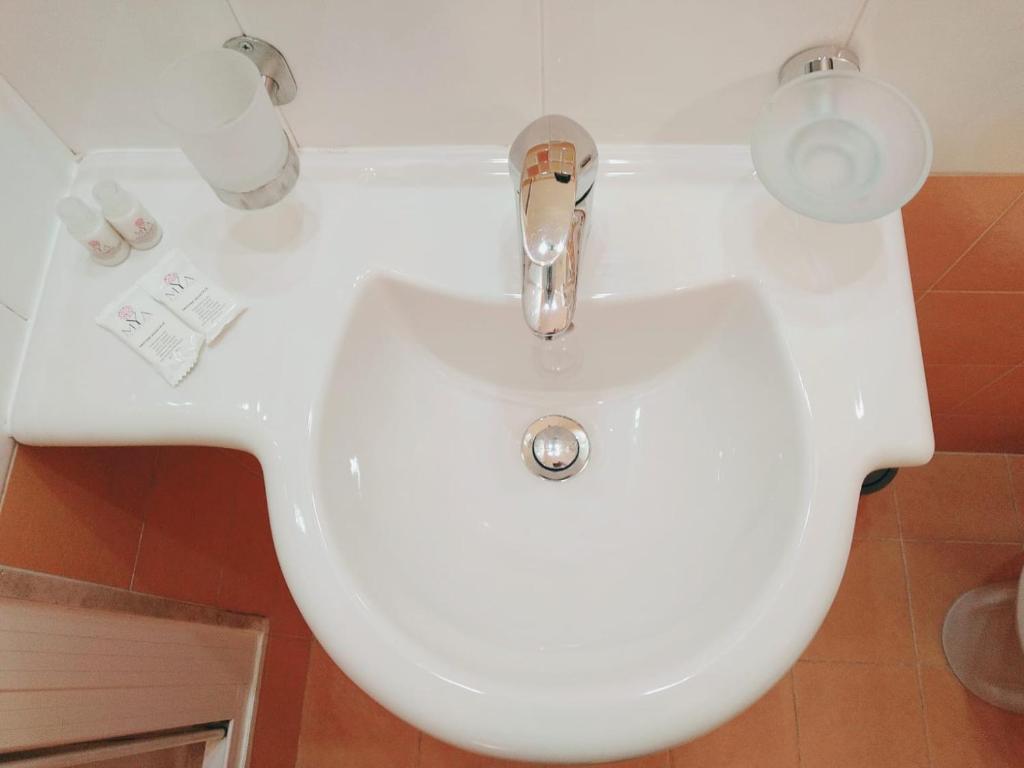 Koupelna v ubytování Hotel Fenicia