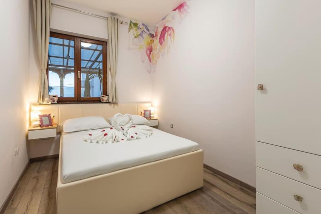 Posteľ alebo postele v izbe v ubytovaní Holiday apartment Capeta