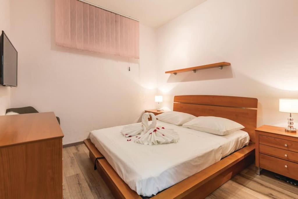 Posteľ alebo postele v izbe v ubytovaní Holiday apartment Capeta