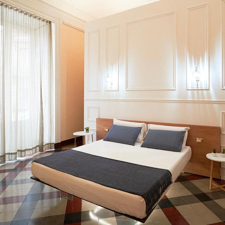 מיטה או מיטות בחדר ב-Toscano Palace Luxury Rooms Catania