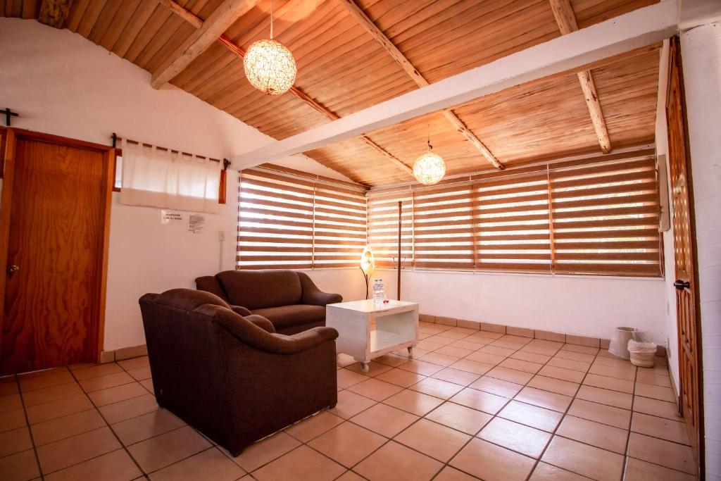 Coin salon dans l'établissement Hotel boutique Teocalli