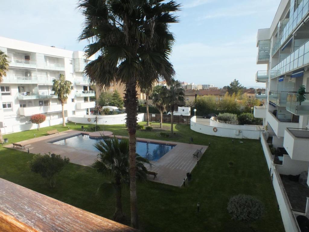 Bazén v ubytovaní Apartamento acogedor con piscina comunitaria y parking en Roses, cerca de la playa y atracciones - ES-204-39 alebo v jeho blízkosti