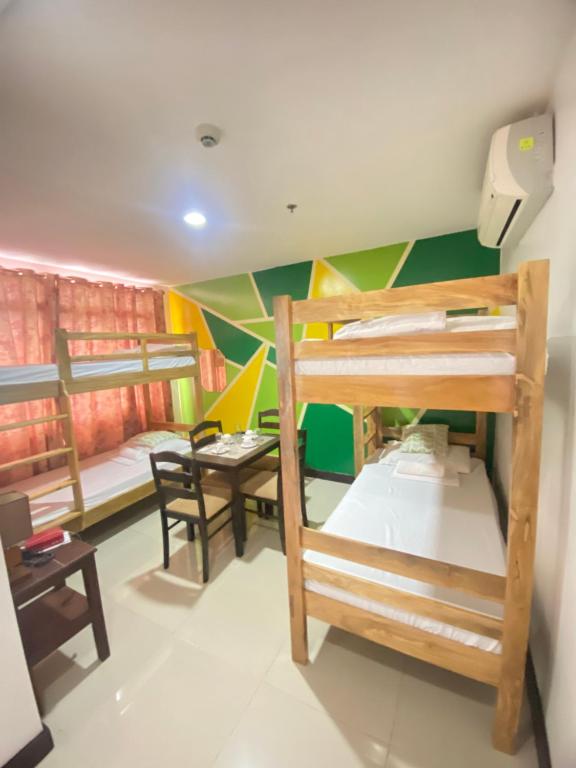 Postel nebo postele na pokoji v ubytování BOPEMPC Safari Hostel