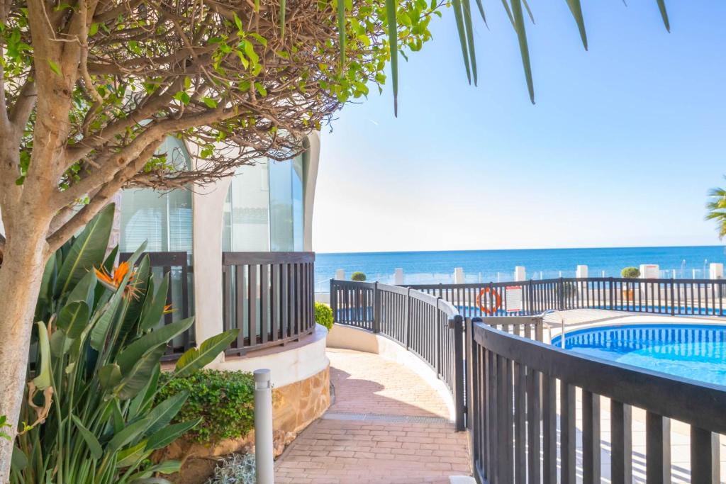 The swimming pool at or close to Puerta del mar 2 - Happy Rentals