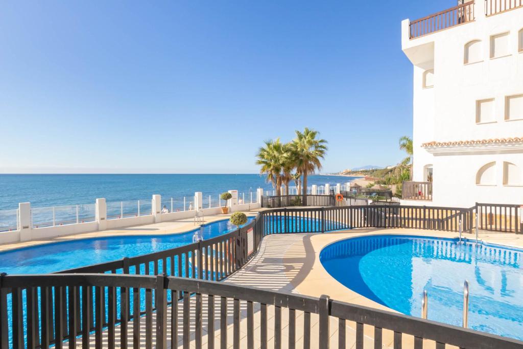 The swimming pool at or close to Puerta del mar 2 - Happy Rentals
