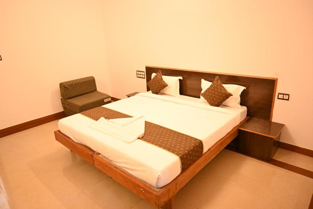 Postel nebo postele na pokoji v ubytování Advaitha Serenity Resorts