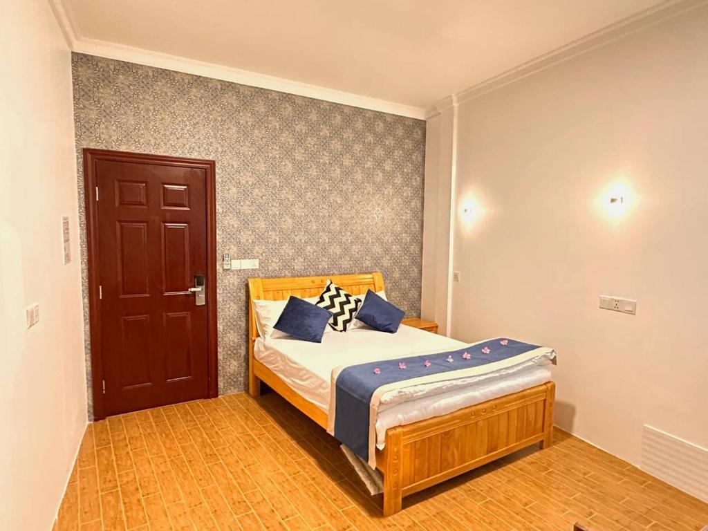 Postel nebo postele na pokoji v ubytování Aqua Sunset