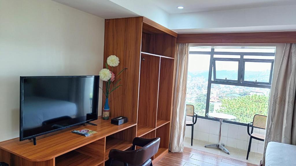 TV a/nebo společenská místnost v ubytování 456 Hotel
