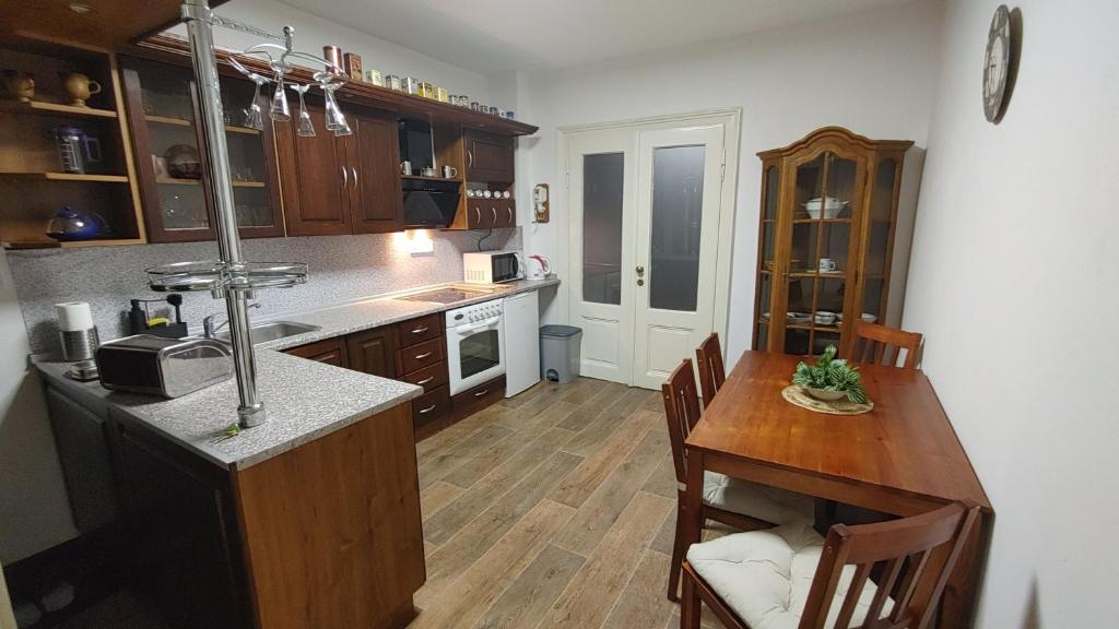 Kuchyň nebo kuchyňský kout v ubytování Apartmány Šitavanc