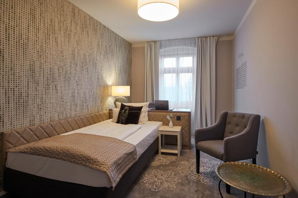 Letto o letti in una camera di Hotel Via Regia - VIAs-Hotels
