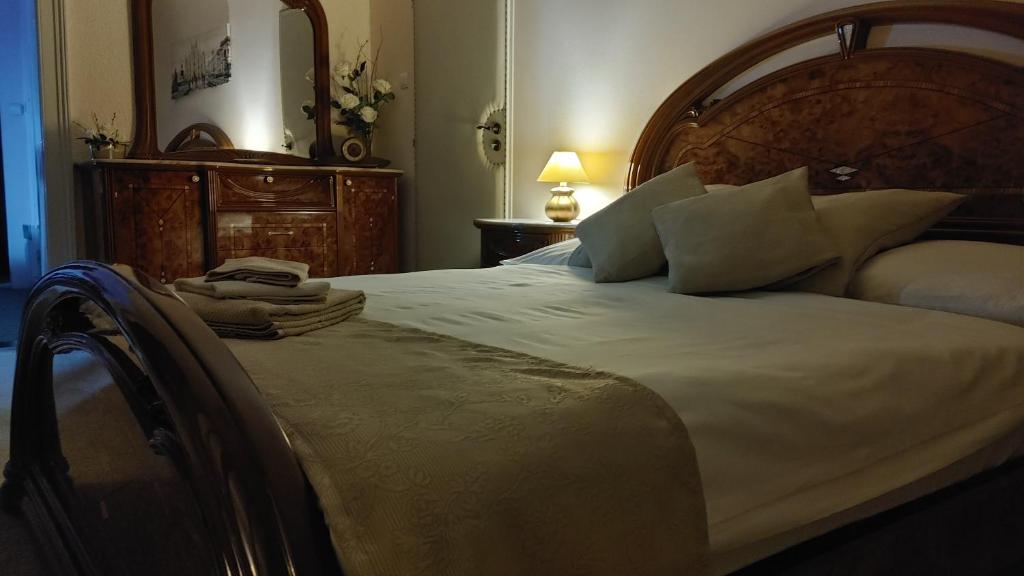 Postel nebo postele na pokoji v ubytování Apartmány Šitavanc