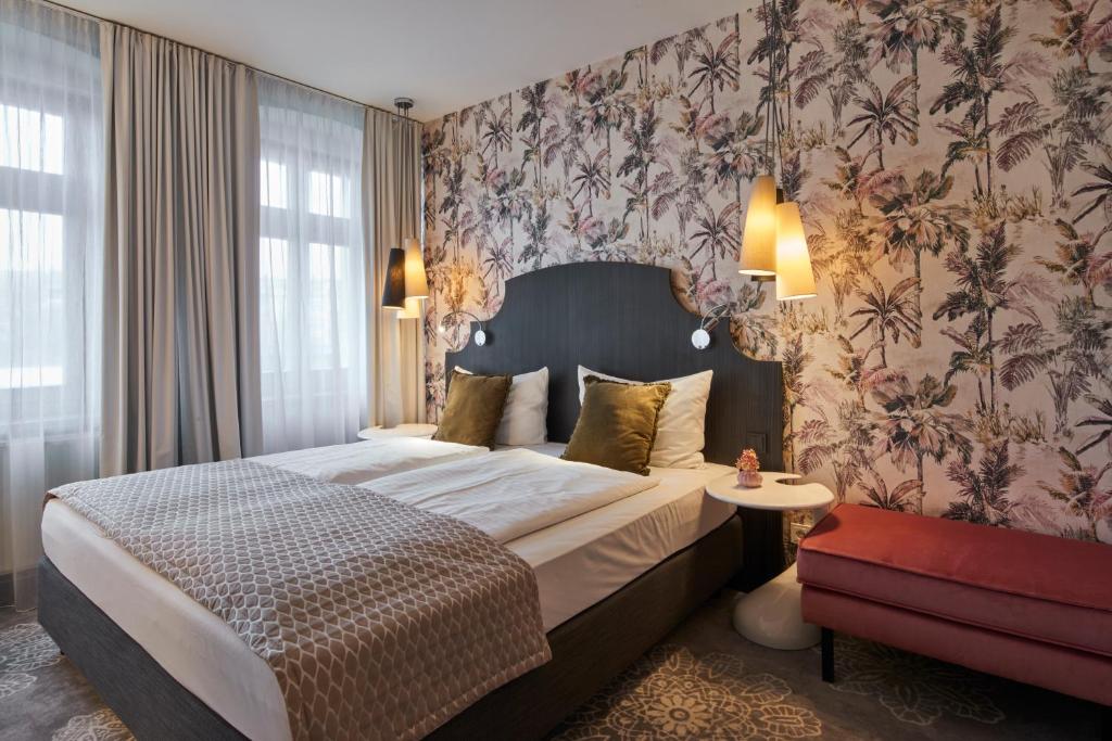Letto o letti in una camera di Hotel Via Regia - VIAs-Hotels
