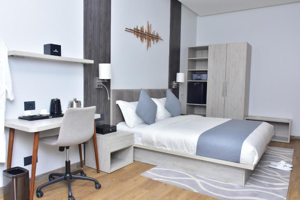 Postel nebo postele na pokoji v ubytování Hotel Stella