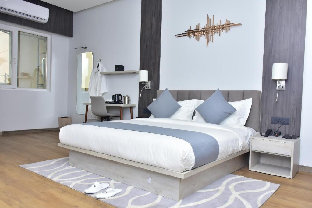 Postel nebo postele na pokoji v ubytování Hotel Stella
