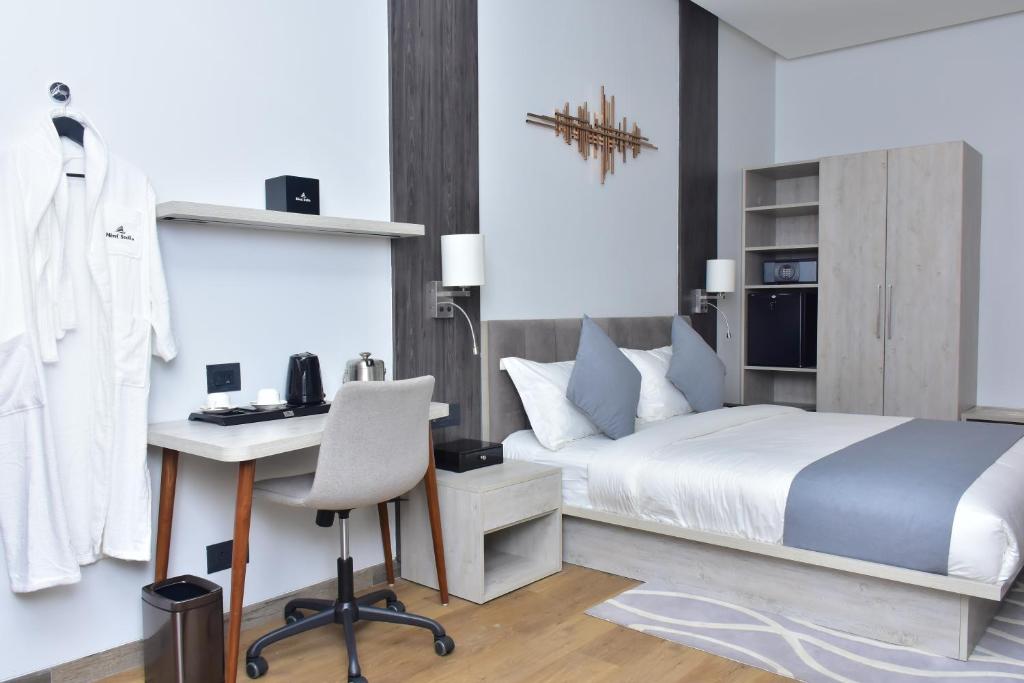 Postel nebo postele na pokoji v ubytování Hotel Stella