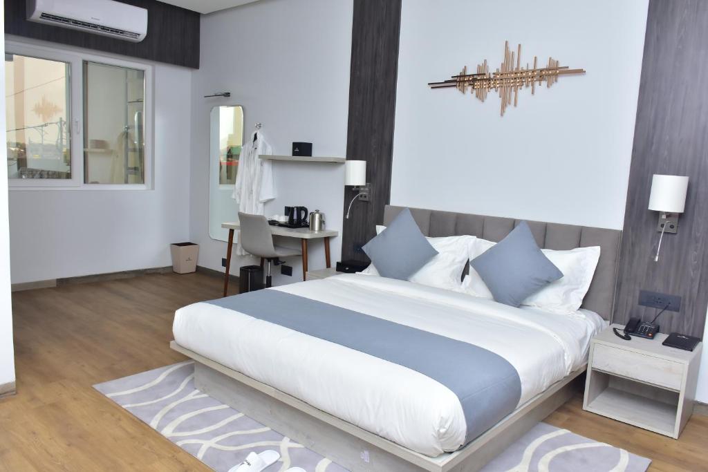 Postel nebo postele na pokoji v ubytování Hotel Stella