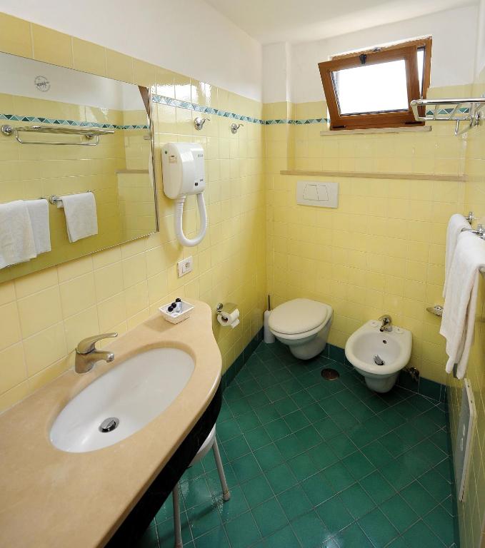 Koupelna v ubytování Hotel Tourist