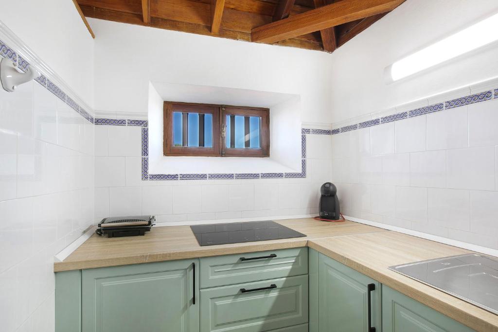 Kuchyň nebo kuchyňský kout v ubytování Casa Rural Dragomar