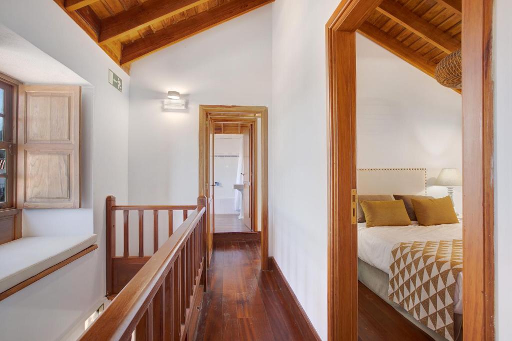 Postel nebo postele na pokoji v ubytování Casa Rural Dragomar