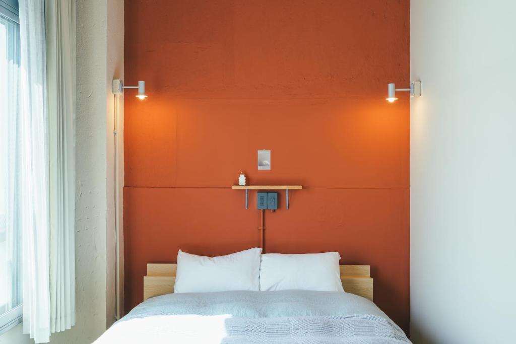 Postel nebo postele na pokoji v ubytování Kiten - slow & work stay -