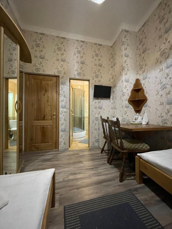 TV a/nebo společenská místnost v ubytování MiniApartamentsKV