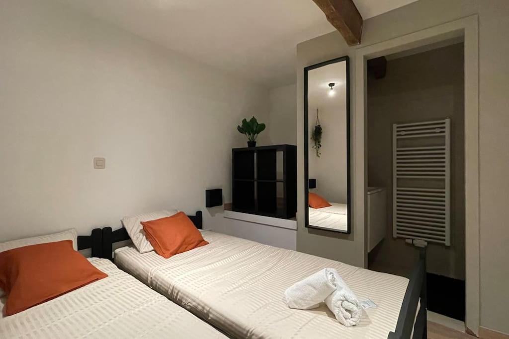 Ein Bett oder Betten in einem Zimmer der Unterkunft Le Belle-Vue