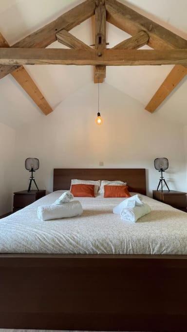 Ein Bett oder Betten in einem Zimmer der Unterkunft Le Belle-Vue
