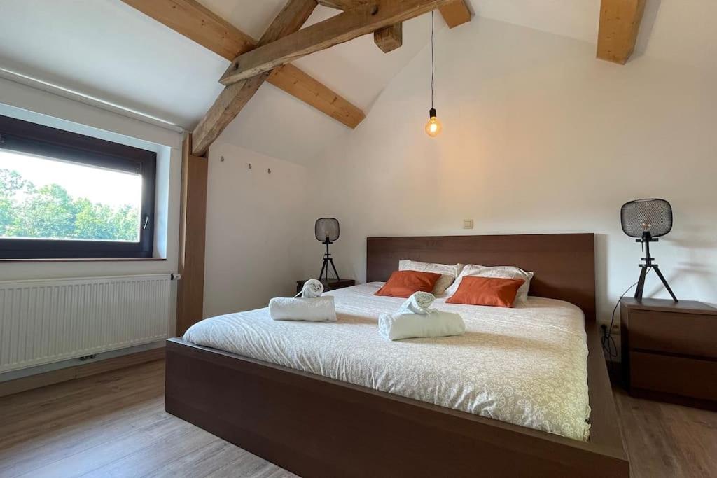 Ein Bett oder Betten in einem Zimmer der Unterkunft Le Belle-Vue