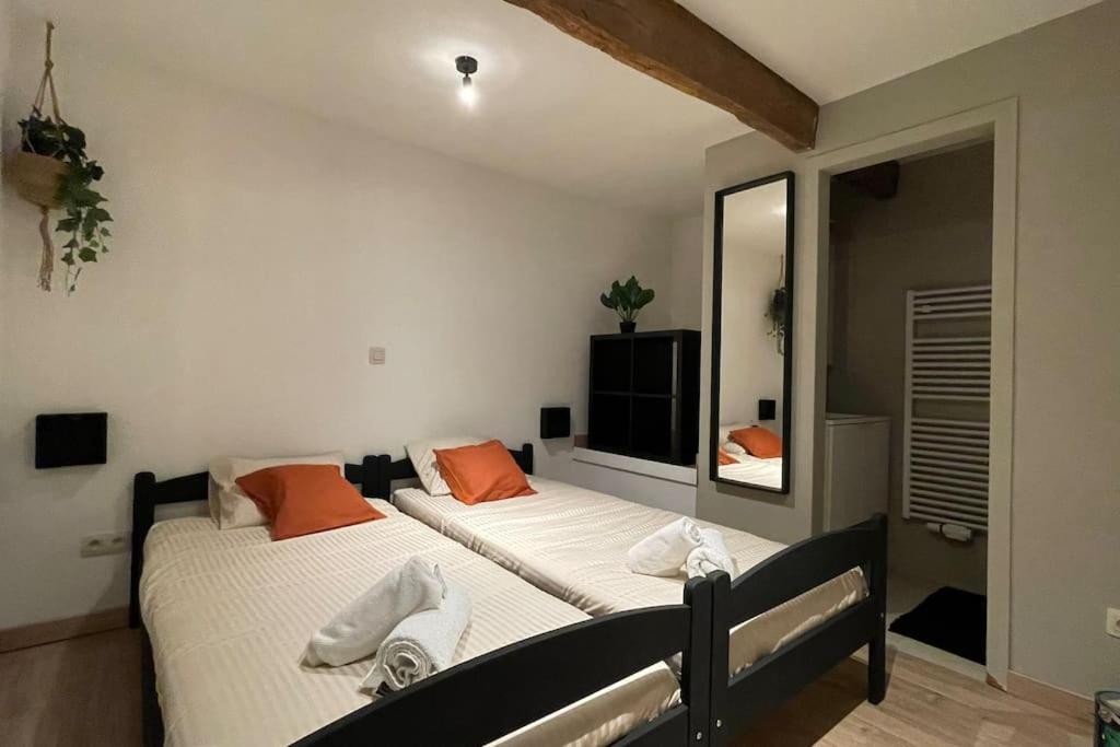 Ein Bett oder Betten in einem Zimmer der Unterkunft Le Belle-Vue