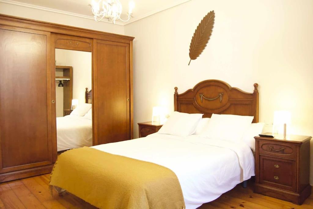 A bed or beds in a room at Apartamento CUNTIS