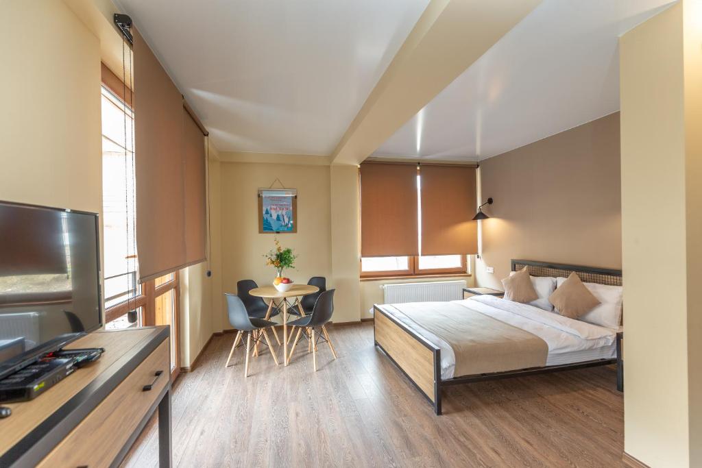Postel nebo postele na pokoji v ubytování Pine Chalets by KA Group