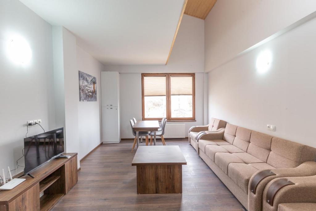 Posezení v ubytování Pine Chalets by KA Group